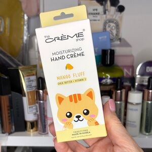 The crème shop mango fluff hand cream